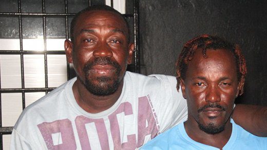 Fishermen Cliff "Fella" Young, let and Canold "Nunks" Miller say Venezuelan pirate robbed them of their money, food, equipment and some of their catch. (iWN photo)