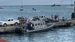 A Coast Guard vessel prepares to leave Union Island, on Thursday, with the body of the deceased and the woman who is assisting the investigation.