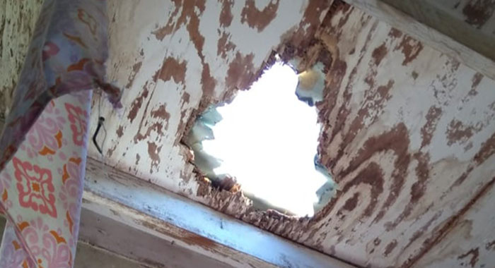 The "gaping" hole in the prison roof through which accused murderers Veron Primus and Ulrick Hanson escaped earlier this month.  