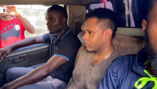 Accused murderer Veron Primus in police custody after being recaptured in Lowmans Hill on Thursday. (iWN photo)