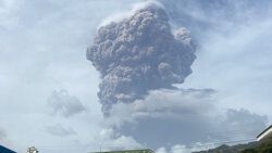 La Soufriere sends and ash plume into the air during and explosive eruption Friday afternoon, seen from Kingstown, on the southern end of St. VIncent. (iWN photo)