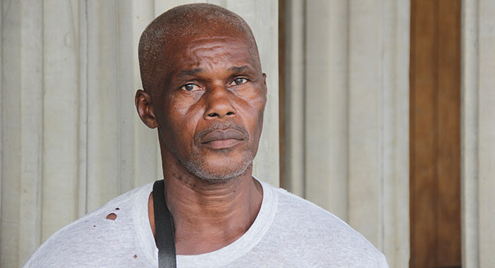 The shooting victim, and threatening language accused, Cornelius John. (iWN file photo)