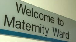 Maternity services: Report recommends giving pregnant women personal budgets for maternity care; T02031502 / 2.3.2015
Cumbria: Furness General Hospital:
Sign "Welcome to Maternity Ward"
Hospital corridor TRACK