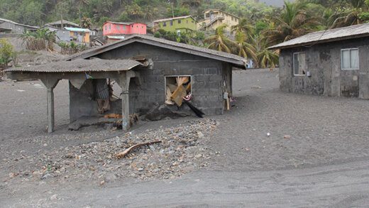 Houses in Sandy Bay, which were destroyed by floods after the eruption of La Soufriere in April. (iWN photo)