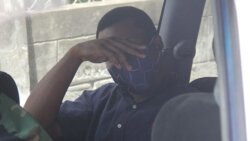 Aneil Hayzelwood sits in a police vehicle awaiting transportation to prison on Tuesday. (iWN photo)