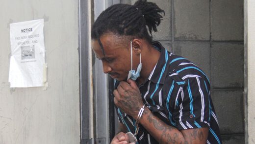Avi King on his way to prison after his sentencing at the Serious Offences COurt on Tuesday. (iWN photo)