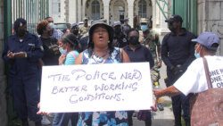 Protesters and police officers in Kingstown on Thursday. (iWN photo) 