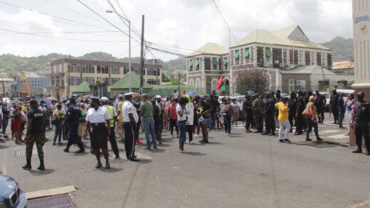 Protesters and police officers in Kingstown. (iWN photo)
