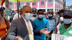 Opposition Leader Godwin Friday in conversation with protesters in Kingstown on Aug. 5, 2021. On Monday, March 13, 2023, he welcomed the High Court ruling that the government's vaccine mandate was illegal. (iWN photo)