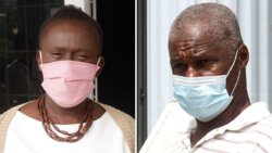 Nicole John, left, and her husband, Cornelius John, outside the Biabou Magistrate's Court, sitting in Calliaqua, on Friday. (iWN photos)