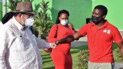 Prime Minister Ralph Gonsalves greets supporters at Argyle International Airport on his return to St. Vincent from Barbados on Monday. (Photo: Lance Neverson/Facebook.) 