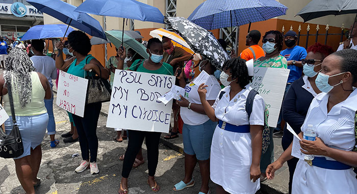 Nurses among protesters outside Parliament, on Aug. 5, 2021. (iWN Photo)