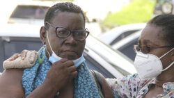 The accused, Annamay Lewis, left, and former diplomat Doris Charles, outside the Kingstown Magistrate's Court, after the arraignment, on Monday. (iWN photo)