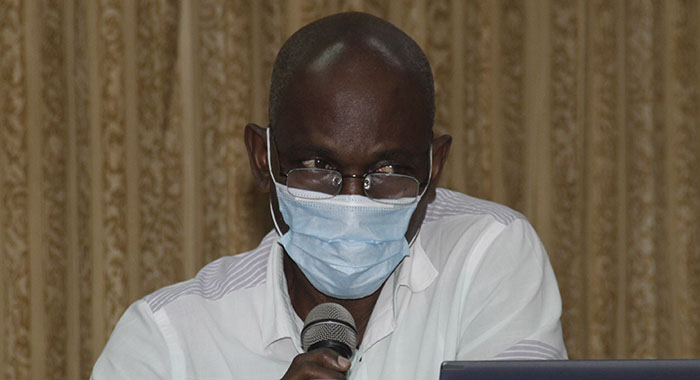 Jomo Thomas at a press conference in Kingstown last week Tuesday, Sept. 7, about five days before be began feeling "unwell". (iWN photo)