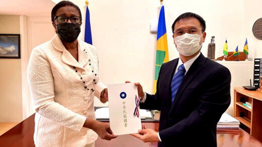 Taiwan Ambassador Peter Shai-Li Lan, right, presents his letters of credence to Governor General Dame Susan Dougan.  