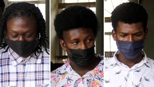From left, Ozem Oliver, Andreas Bruce, and D’Andre Peters outside the High Court in Kingstown, Oct. 25, 2021 after their sentencing. (iWN photos)