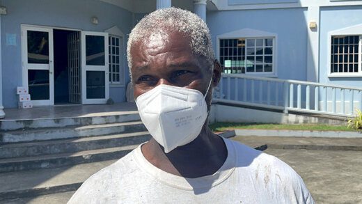 Cornelius John outsdide the court in Calliaqua, after the charge against him was dismissed today, Friday, Nov. 26, 2021. (iWN photo)