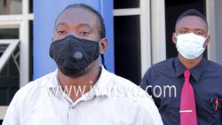 A detective escorts the accused, Jomal McMaster, left, to prison on Thursday, Feb. 10, 2022.