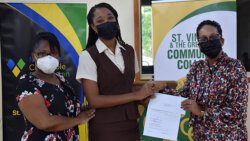 S. Marise Butler, dean - Division Teacher Education, SVGCC;  Niesha Richards, bursary recipient and Natalia Gill, project director - Mustique Charitable Foundation.