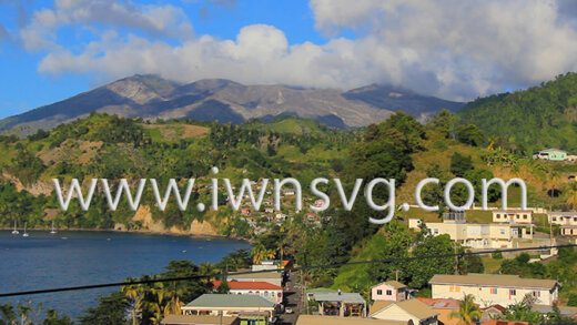 Chateaubelair and Fitz Hughes with La Soufriere in the background.