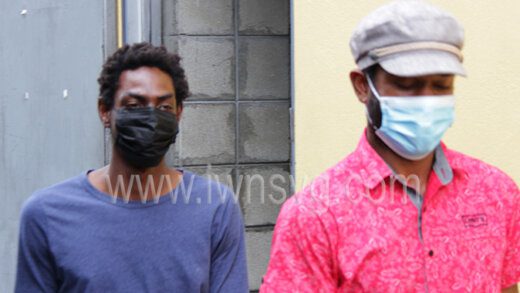 The defendant, Zico Graham, left and Christopher Johnson outside the court in Kingstown on Wednesday, April 27, 2022.  