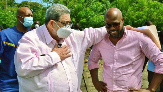MP for North Leeward, Carlos James, right in conversation with Prime Minister Ralph Gonsalves, during an official visit of the quarry site in Richmond on March 11, 2022. (Photo: Lance Neverson/Facebook) 
