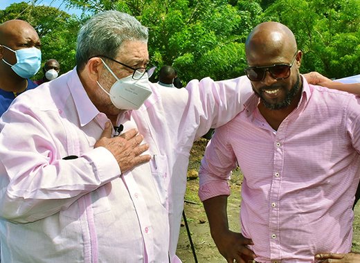 MP for North Leeward, Carlos James, right in conversation with Prime Minister Ralph Gonsalves, during an official visit of the quarry site in Richmond on March 11, 2022. (Photo: Lance Neverson/Facebook) 