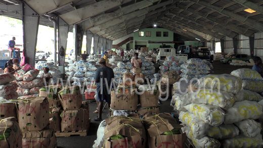 Traffickers prepare produce for export in Kingstown on Sunday, April 10, 2022.