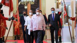 Prime Minister Ralph Gonsalves, forefront, with a bandaged left hand in Venezuela on Monday, April 25, 2022. (Photo: Nicolas Maduro/Twitter)