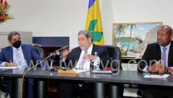 Prime Minister and Political Leader of the Unity Labour Party, Ralph Gonsalves, centre, flanked by Finance Minister, Camillo Gonsalves, left, and Agriculture Minister, Saboto Caesar at an APril 28, 2022 press conference. 
