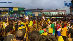 Patrons throw projectiles during the Soca Monarch show on Sunday, July 3, 2022.