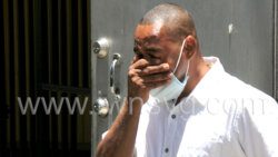 Inegus Miguel cries as he leaves the Serious OFfences COurt on Aug. 8, 2022, after being freed of drug possession and drug trafficking charges.
