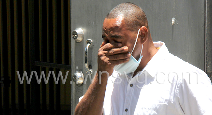 Inegus Miguel cries as he leaves the Serious OFfences COurt on Aug. 8, 2022, after being freed of drug possession and drug trafficking charges.