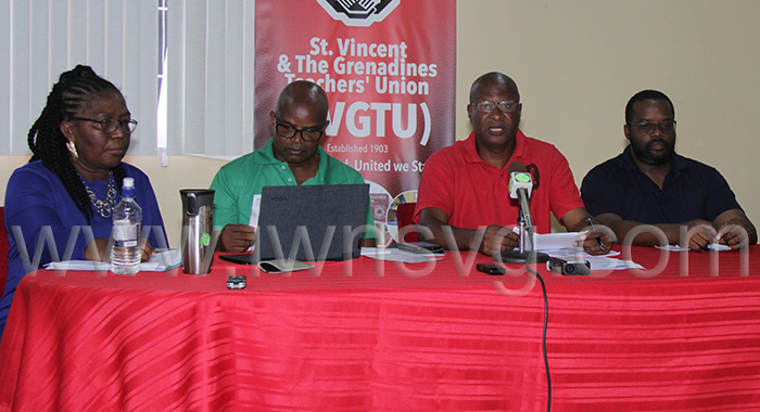 From left: Gweneth Baptiste-Stoddard, 1st vice president of the PSU, Elroy Boucher, president of the PSU, Oswald Robinson, president of the SVG Teachers’ Union, and Corporal Germano Douglas, chair of the Police Welfare Association brief the media on Sept. 20, 2022 about the outcome of the negotiations. 