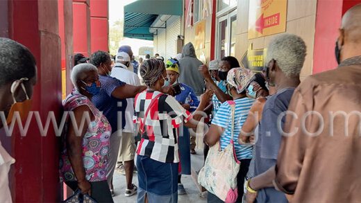 A large crowd outside Western Union in Kingstown in April 2021. 