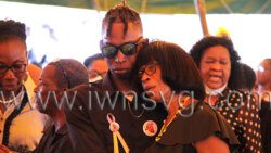 Ishmael Dorrel Bruce’s mother is comforted at his funeral, as well that of the other four accident victims in Clare Valley on Sunday, Oct. 16, 2022.  