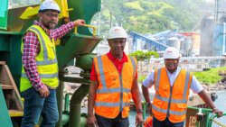 Ricardo Adams, technical advisor, ECGC, Bertram Kingsley Dyer, head of production-Grains, ECGC, and J. Robert Cato,  chief executive of ECGC the aboard grains vessel.