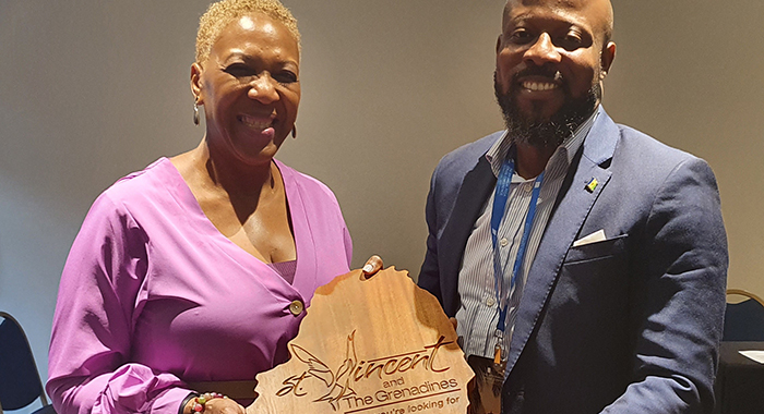 Minister of Tourism Hon. Carlos James shares a moment with Associate Vice President Government Relations Caribbean for Royal Caribbean Group Wendy McDonald