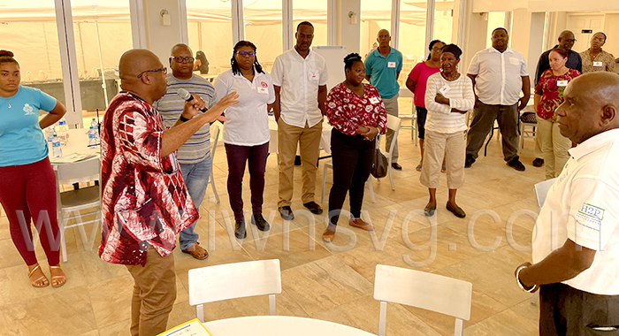 Participants engage in an activity during the workshop in Bequia on Monday, Nov. 7, 2022. 