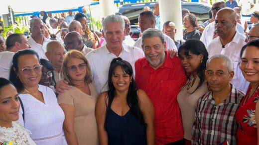 President of Cuba, Miguel Díaz-Canel and Prime Minister Ralph Gonsalves pose with Cuban health care workers at the Modern Medical and Diagnostic Centre in Georgetown on Sunday, Dec. 4, 2022. (Photo: API/Facebook)