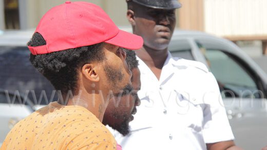 Elomon Phillips, in red cap, outside Kingstown Magistrate's Court on Tuesday, Jan. 3, 2023.