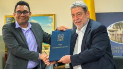 Prime Minister Ralph Gonsalves, right, and General Manager of Demerara Bank Ltd., Dowlat Parbhu. (Photo: Facebook/APISVG)