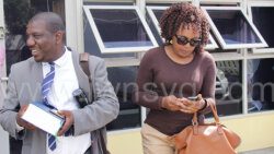 Defence counsel Israel Bruce, left, and his client, Mitra-Ann Prescott outside the Kingstown Magistrate's Court on Thursday, Jan. 29, 2022.