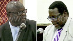 Minister of Education Curtis King, left, and opposition lawmaker, MP for Southern Grenadines, Terrance Ollivierre speaking in Parliament on Thursday, Feb. 23, 2023.