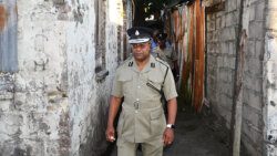 Commissioner of Police Colin John leads senior police officer on a walk through Paul's Avenue as part of community relations efforts on Tuesday, Feb. 14, 2023.