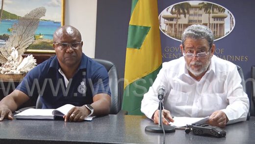 Prime Minister Ralph Gonsalves, right, and Commissioner of Police Colin John in a Feb. 11, 2023 photo.