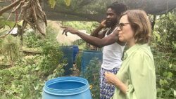 Norwegian ambassador to the Caribbean, Beate Stirø interacts with Rommel “Flex” Spring at his ecological home garden and nursery in Chateaubelair on Saturday, April 22 2023.