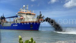 A dredging vessel deposits in Kingstown Bay on April 28, 2023 Sand mined from the seabed off Argyle International Airport. 