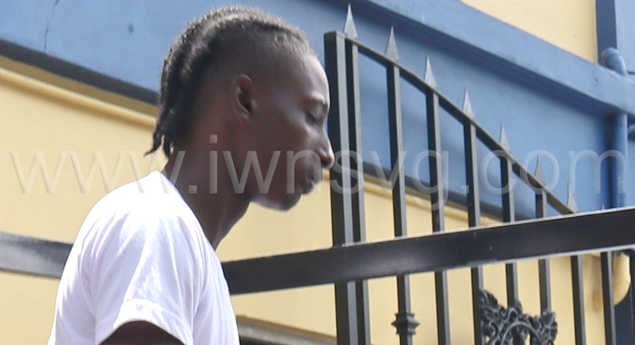 Giovannie Grant on his way to prison for assaulting his girlfriend in Kingstown.