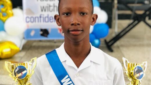 Jadon Alexander Hamilton  at his graduation from Windsor Primary School last month. (Photo: Facebook/Blue Marlins Swim Club SVG)